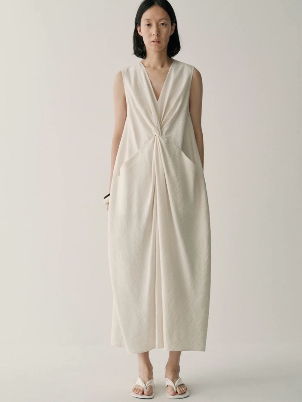 Sleeveless Cream Knot-Front Maxi Dress